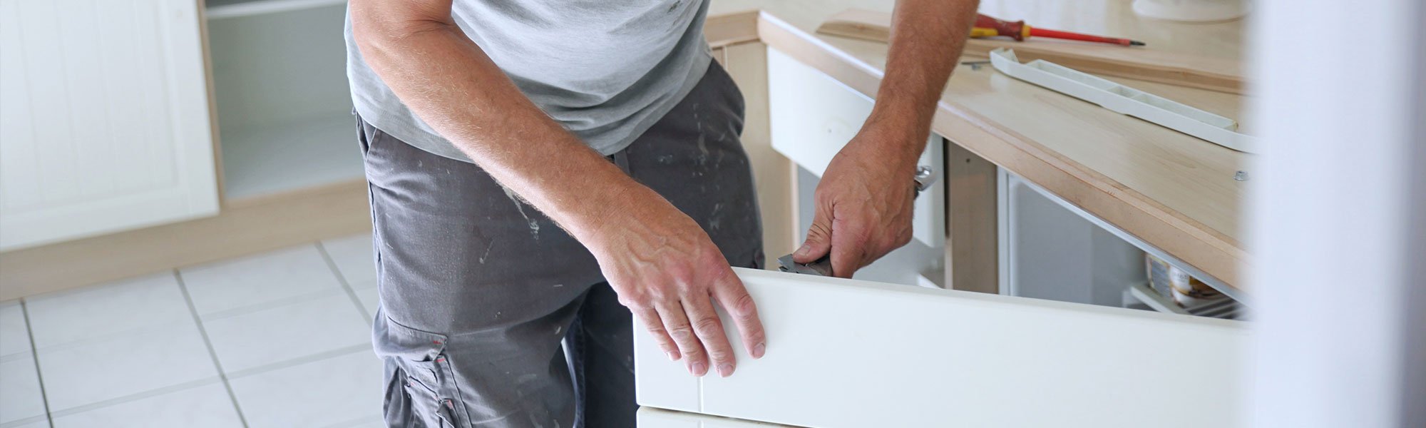 Transform Kitchen Doors installation team working in a Cambridgeshire home